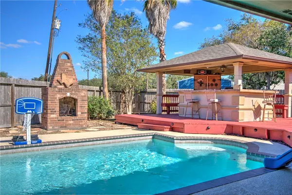 a view of a house with swimming pool