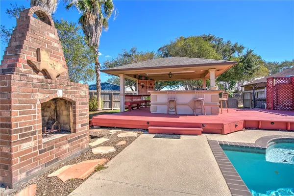 a view of pool with an outdoor seating