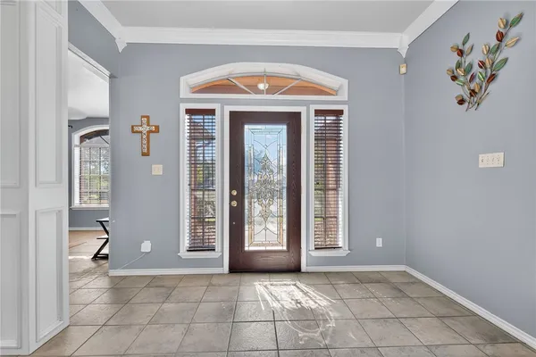 a view of livingroom with furniture and windows