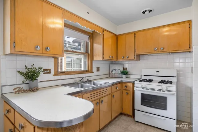 $370,000 | 7657 West Gunnison Street, Norridge, IL 60706