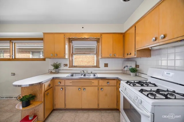 $370,000 | 7657 West Gunnison Street, Norridge, IL 60706