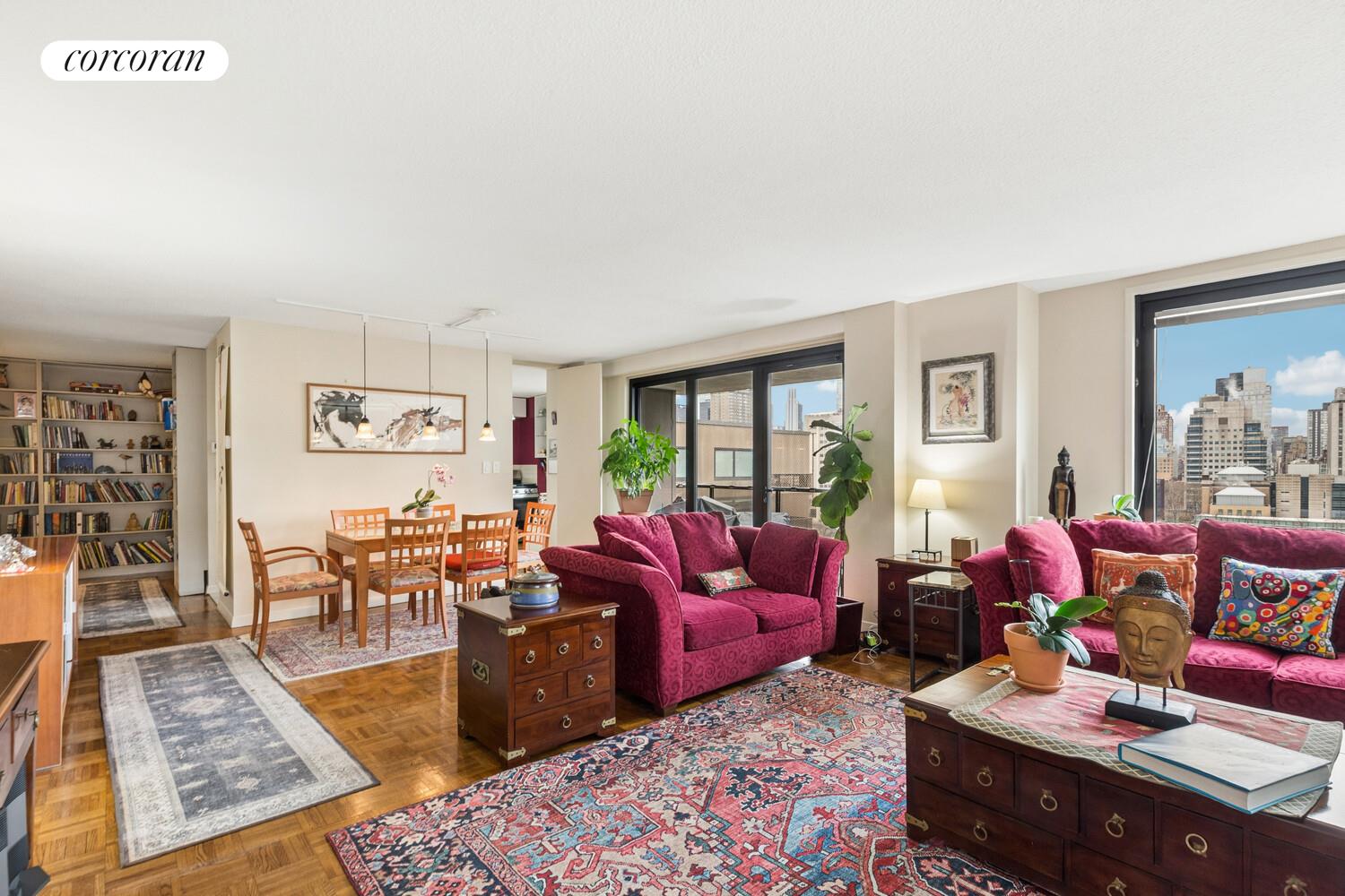 531 Main Street, Unit 1502 Manhattan, NY 10044 - Photo 2 of 11 a living room with furniture rug and window