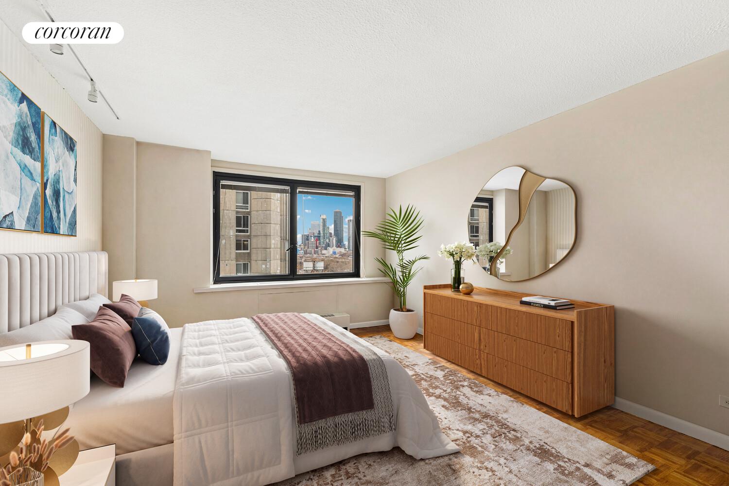 531 Main Street, Unit 1502 Manhattan, NY 10044 - Photo 6 of 11 a bedroom with a bed a mirror on dresser and a window