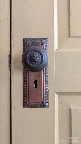 a view of livingroom with furniture and chandelier