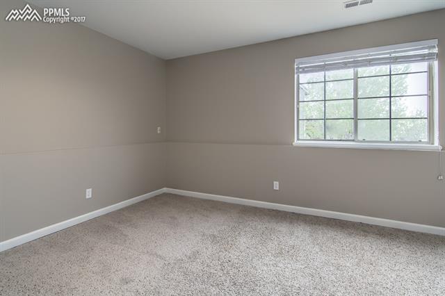 6110 Rabbit Ears Court Colorado Springs, CO 80919 - Photo 24 of 32 2nd basement bedroom