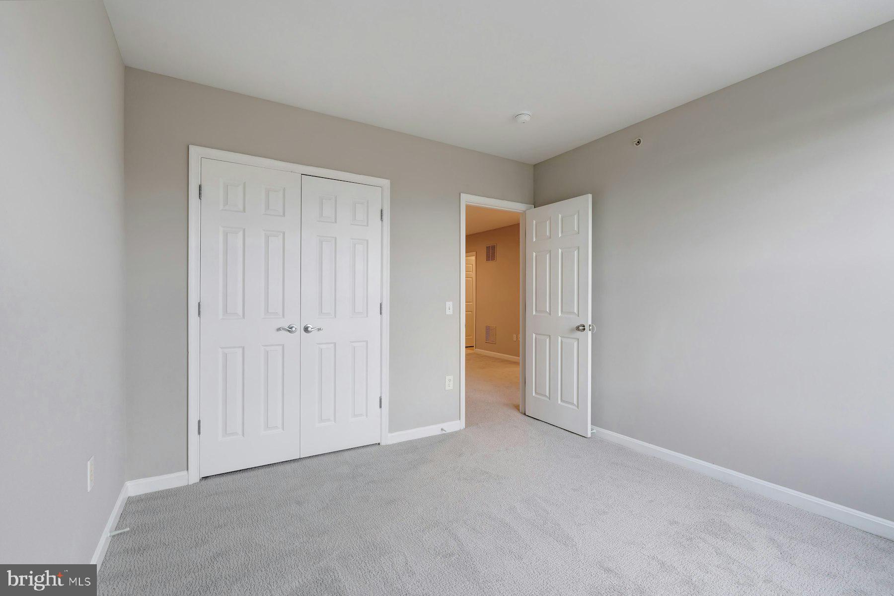 1838 Cedar Cove Way, Unit 201 Woodbridge, VA 22191 - Photo 33 of 38 a view of an empty room and closet area