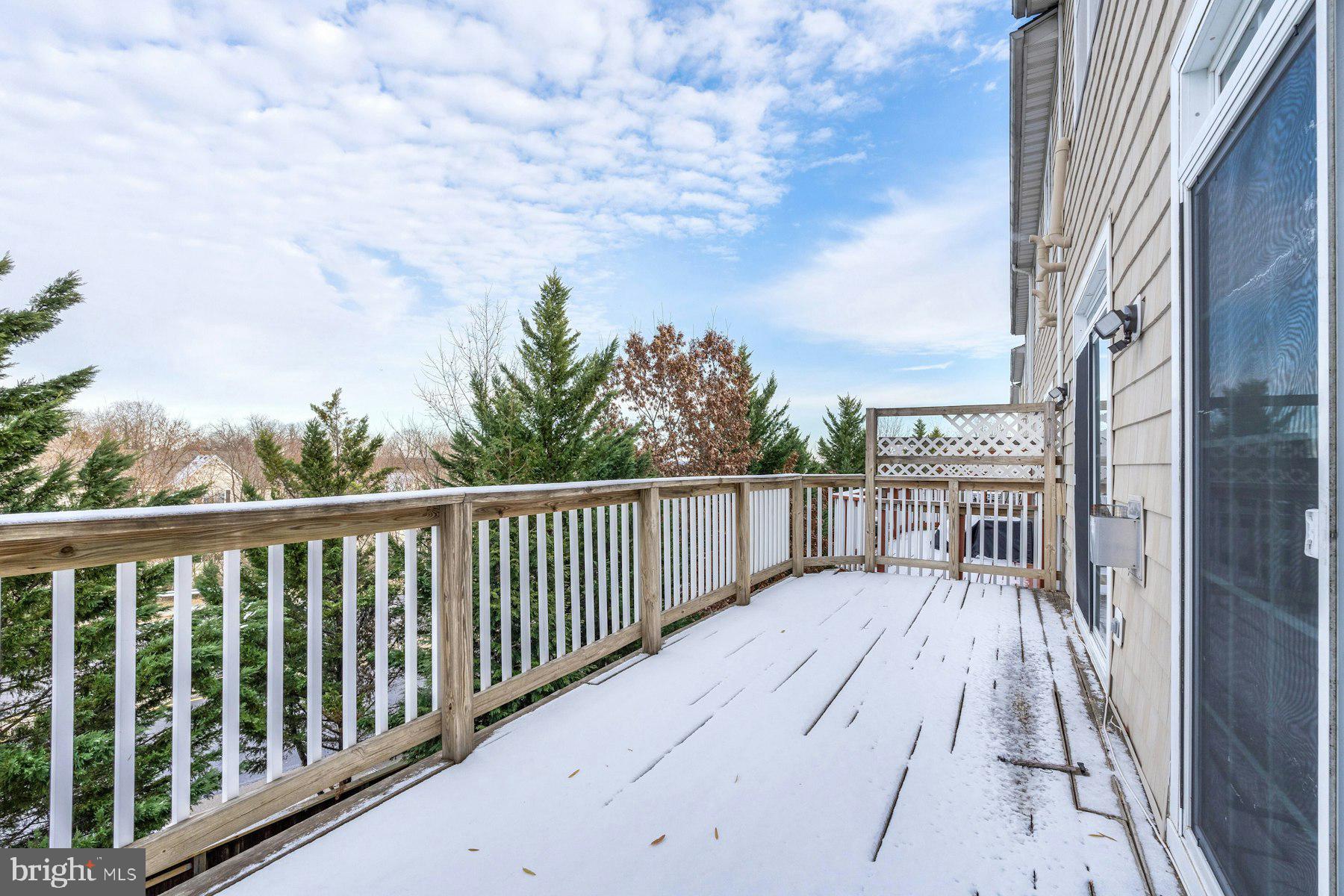1838 Cedar Cove Way, Unit 201 Woodbridge, VA 22191 - Photo 34 of 38 a balcony with wooden floor and fence