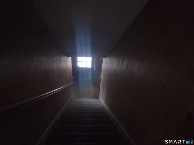 a bathroom with a sink and toilet