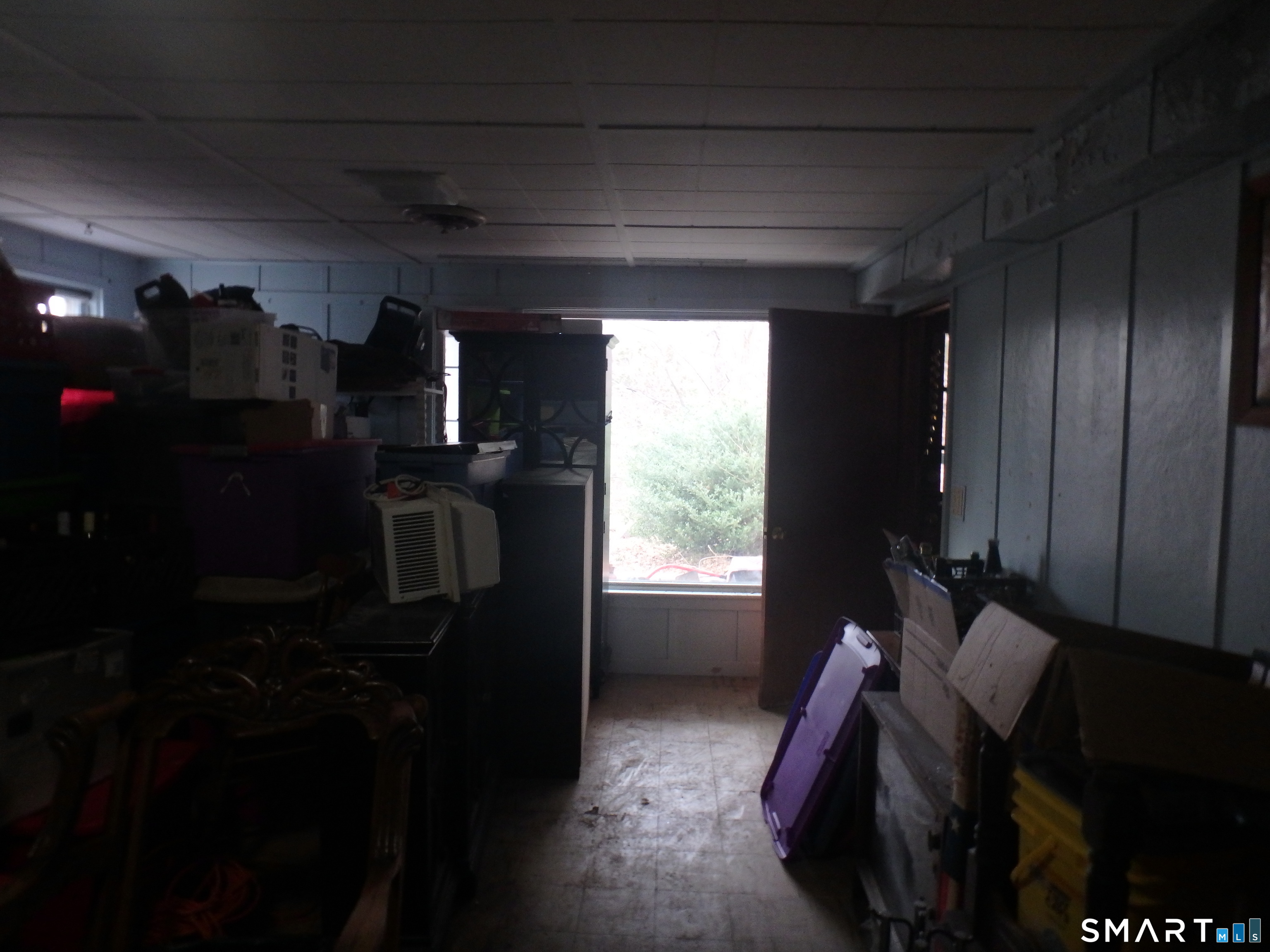 1918 Highway 12 Ledyard, CT 06335 - Photo 12 of 34 a room with furniture and a window