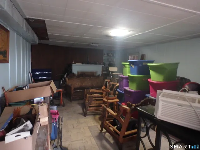 a room with furniture and a window