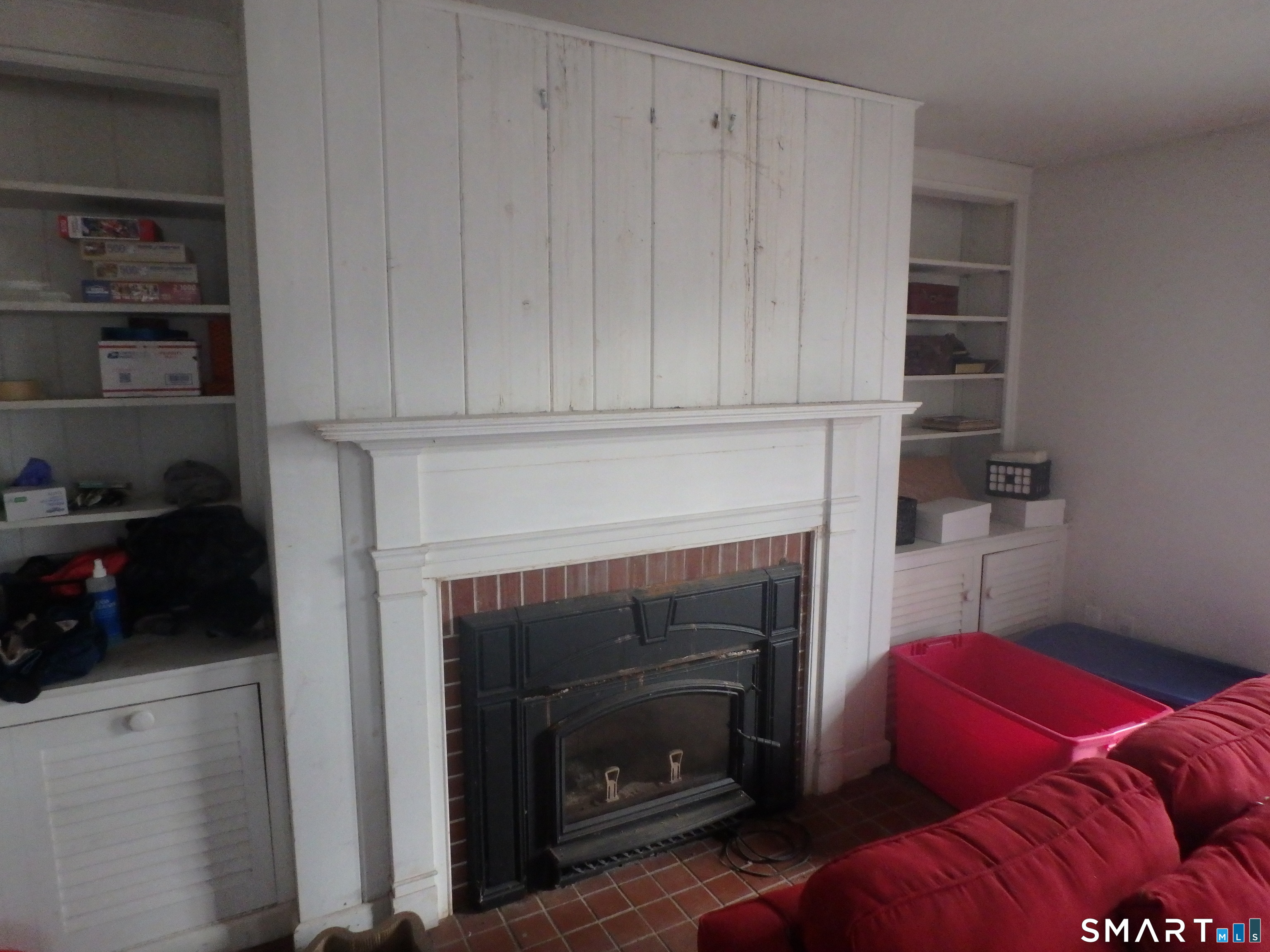 1918 Highway 12 Ledyard, CT 06335 - Photo 2 of 34 a living room with furniture and a fireplace