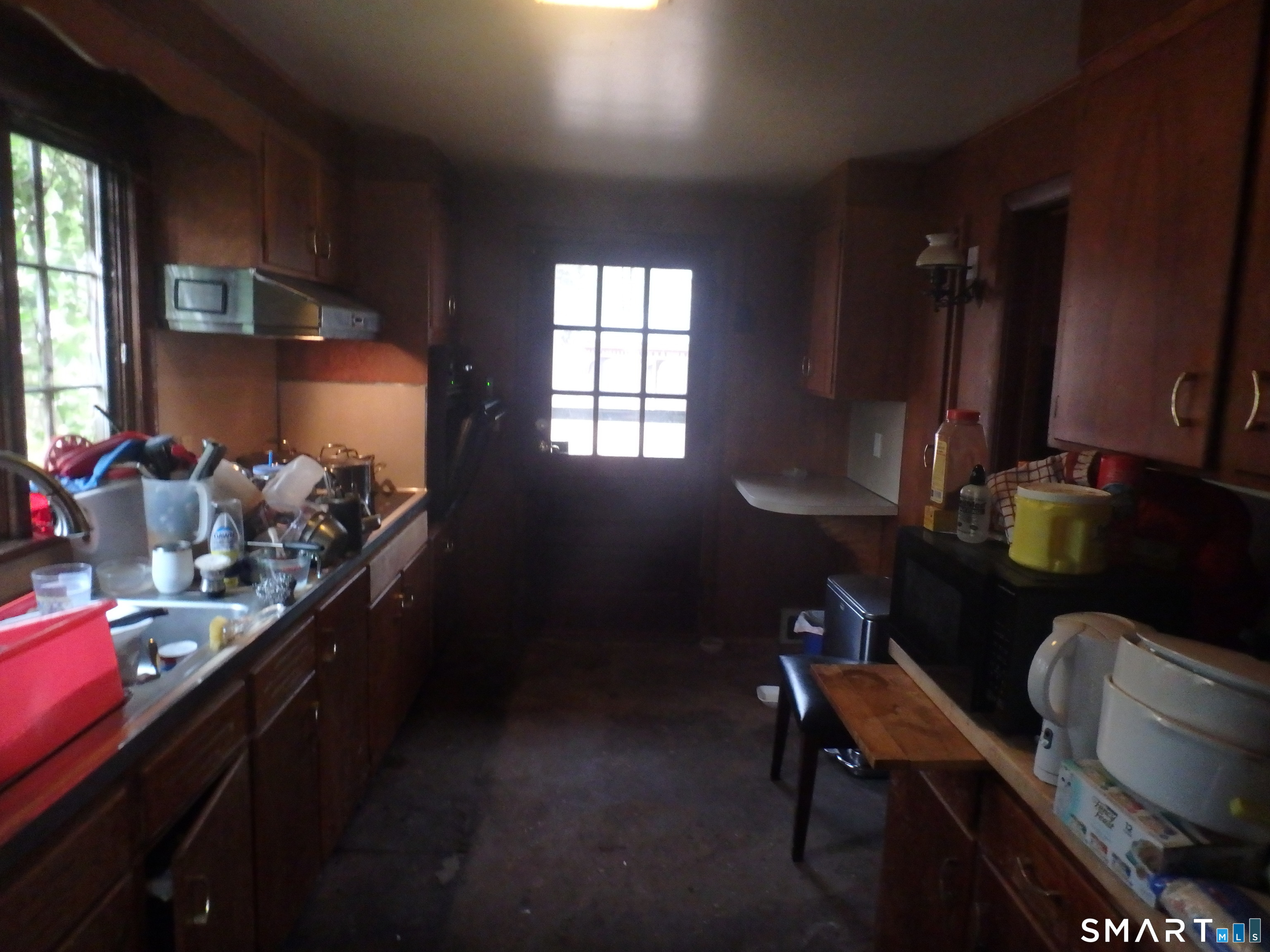 1918 Highway 12 Ledyard, CT 06335 - Photo 25 of 34 a kitchen with granite countertop sink stove and cabinets