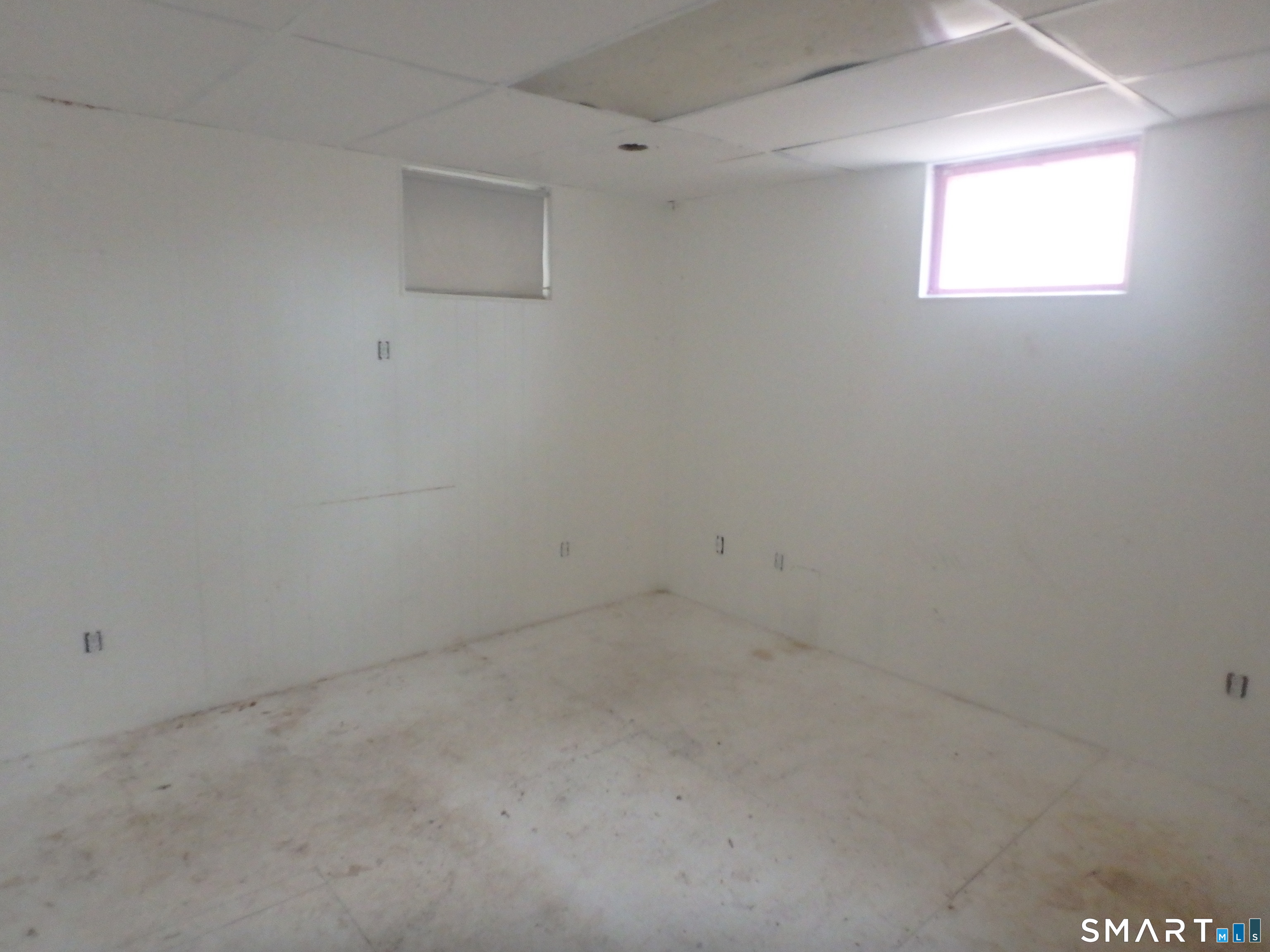 1918 Highway 12 Ledyard, CT 06335 - Photo 30 of 34 an empty room with a window