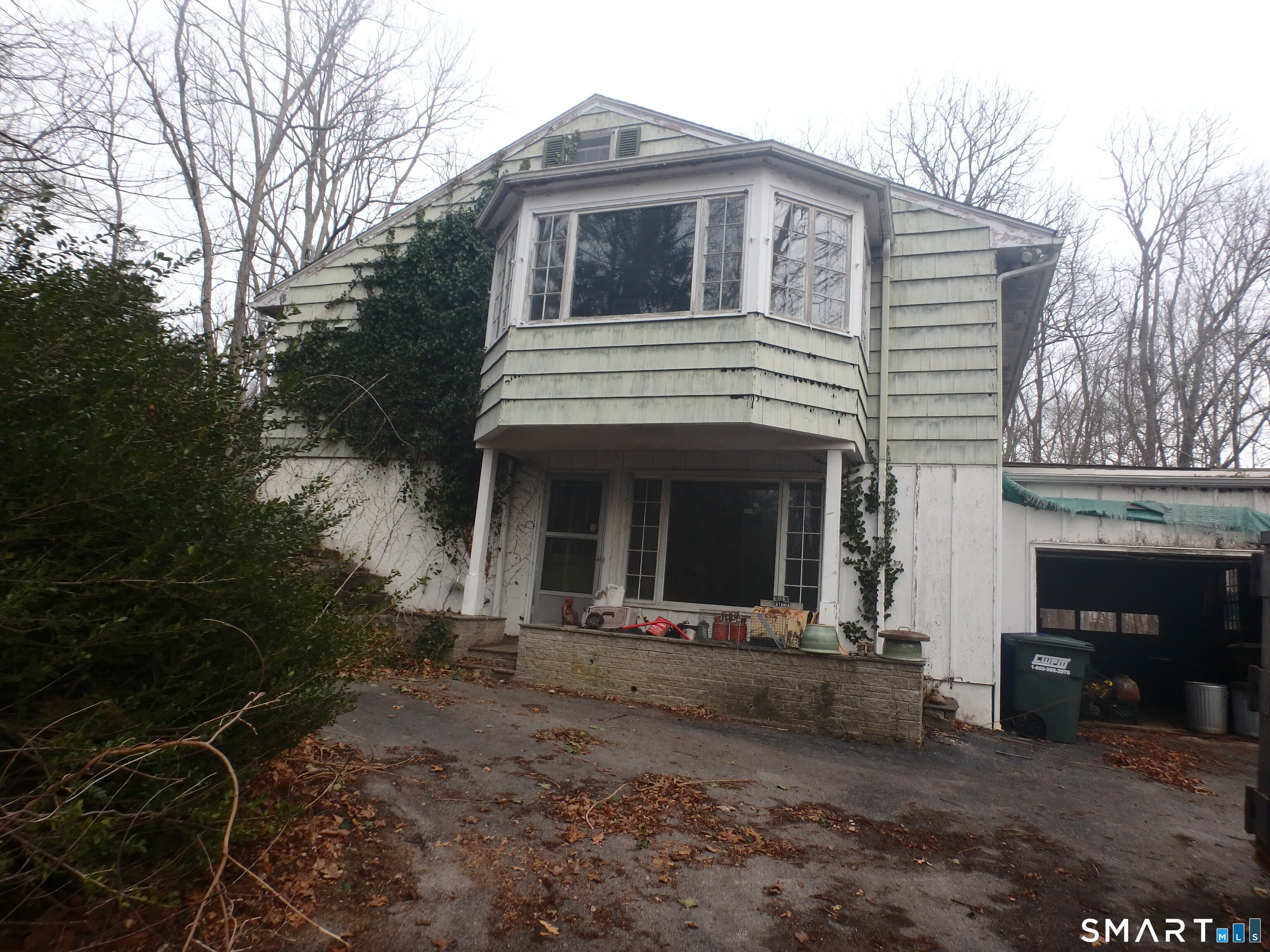 1918 Highway 12 Ledyard, CT 06335 - Photo 31 of 34 a front view of a house with yard