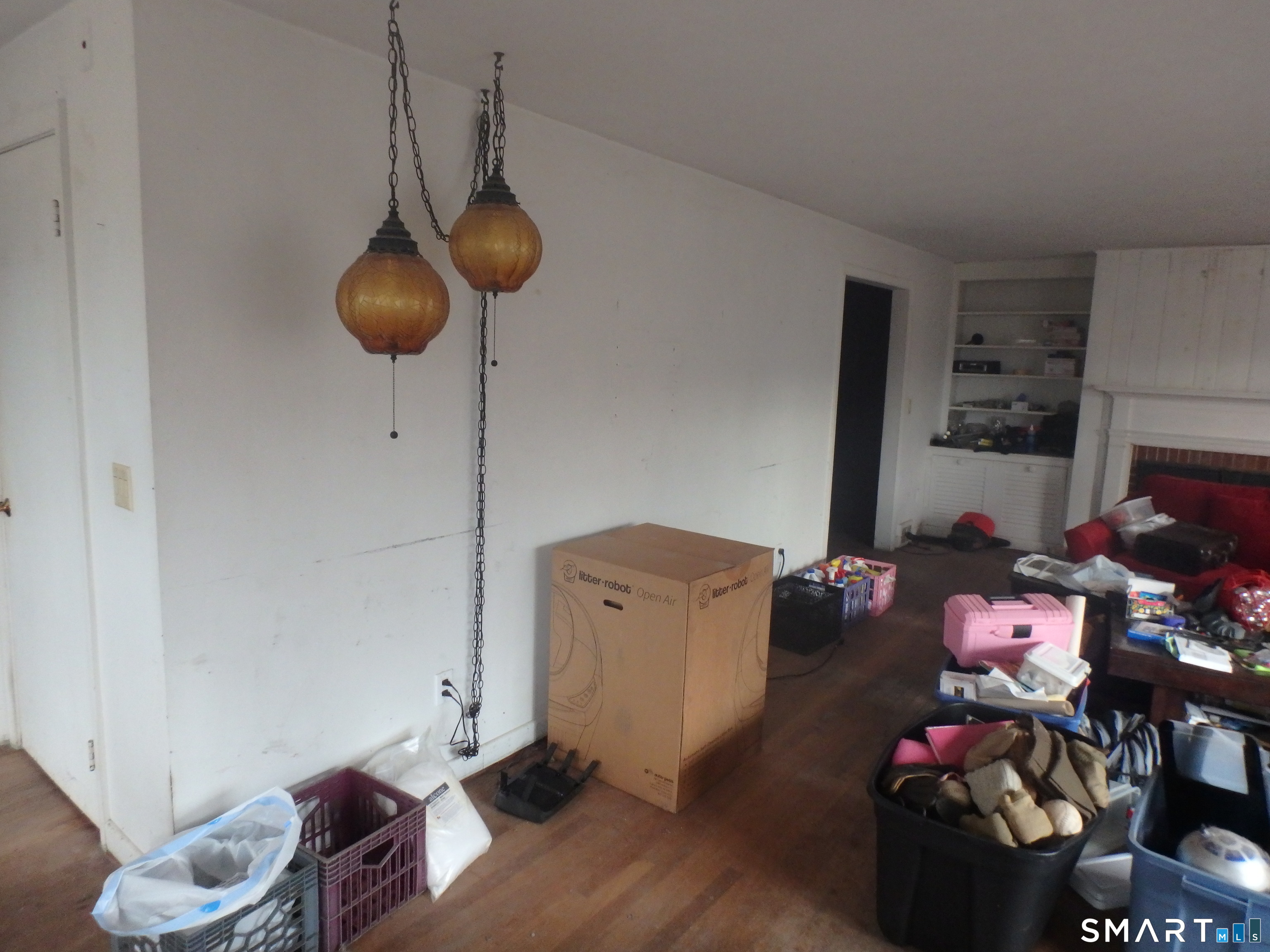 1918 Highway 12 Ledyard, CT 06335 - Photo 6 of 34 a room with furniture and a wooden floor