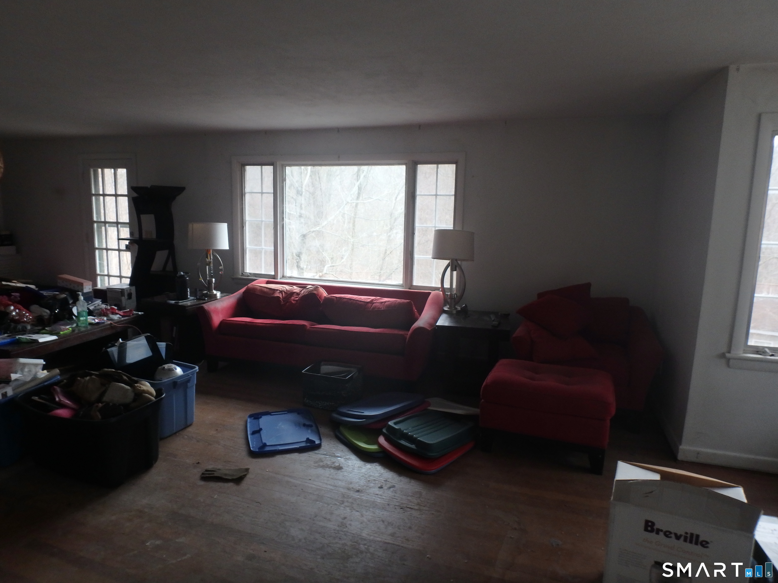 1918 Highway 12 Ledyard, CT 06335 - Photo 7 of 34 a room with furniture toys and a window