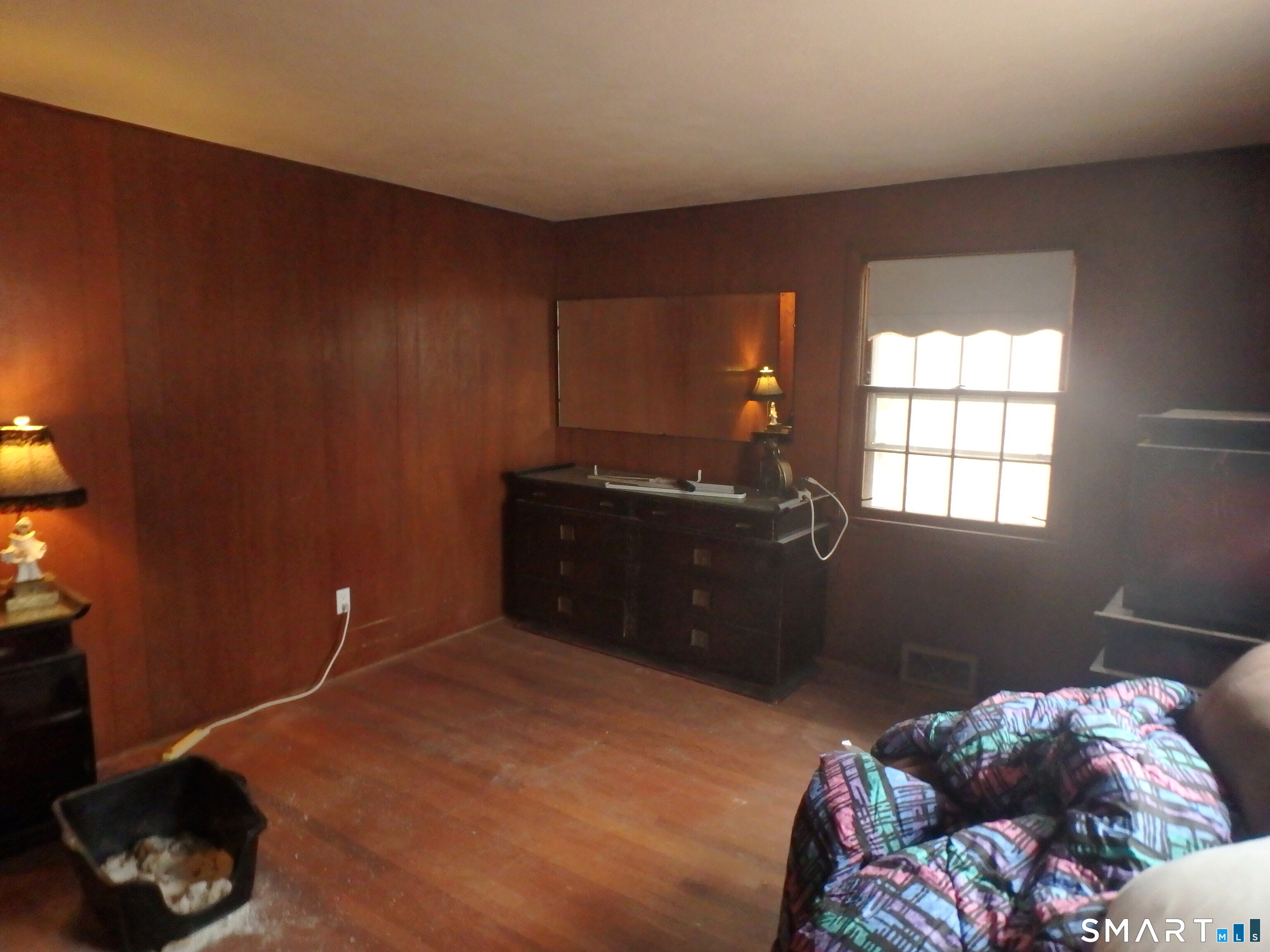 1918 Highway 12 Ledyard, CT 06335 - Photo 10 of 34 a bedroom with a bed and a window