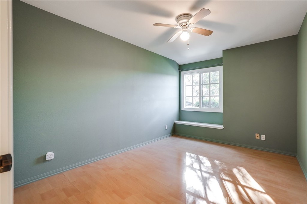 10485 Parakeet Circle Fountain Valley, CA 92708 - Photo 6 of 11 a view of a livingroom with a ceiling fan and window