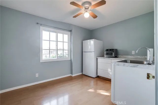 a view of storage and utility room with washer and dryer
