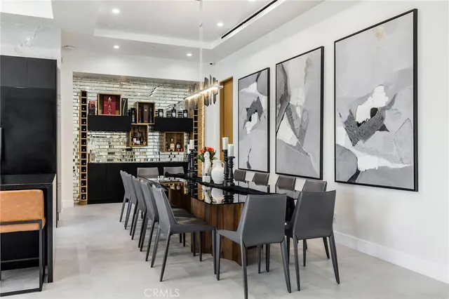 a media room with lots of chairs and a projector