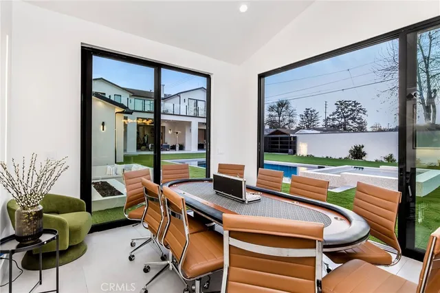 a front view of house with yard and outdoor seating