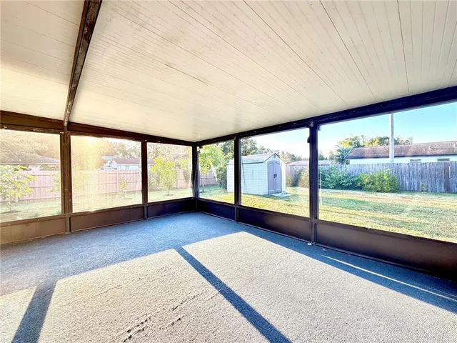 a view of a backyard of the house