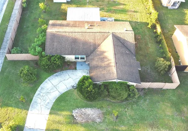 a view of a swimming pool with a garden