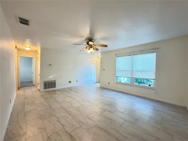 a view of a livingroom with a window