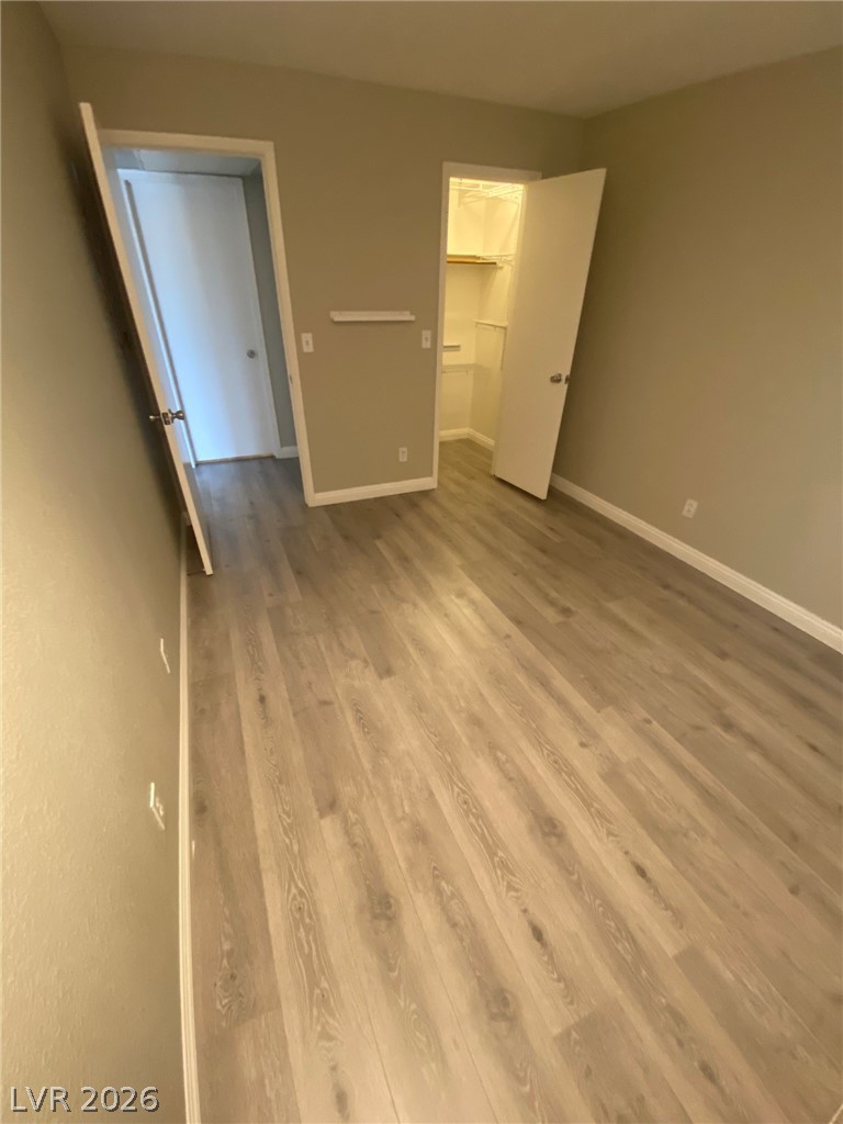 5271 South Lindell Road, Unit 202 Las Vegas, NV 89118 - Photo 20 of 27 Ample closet space complements the serene flooring of this cozy interior.