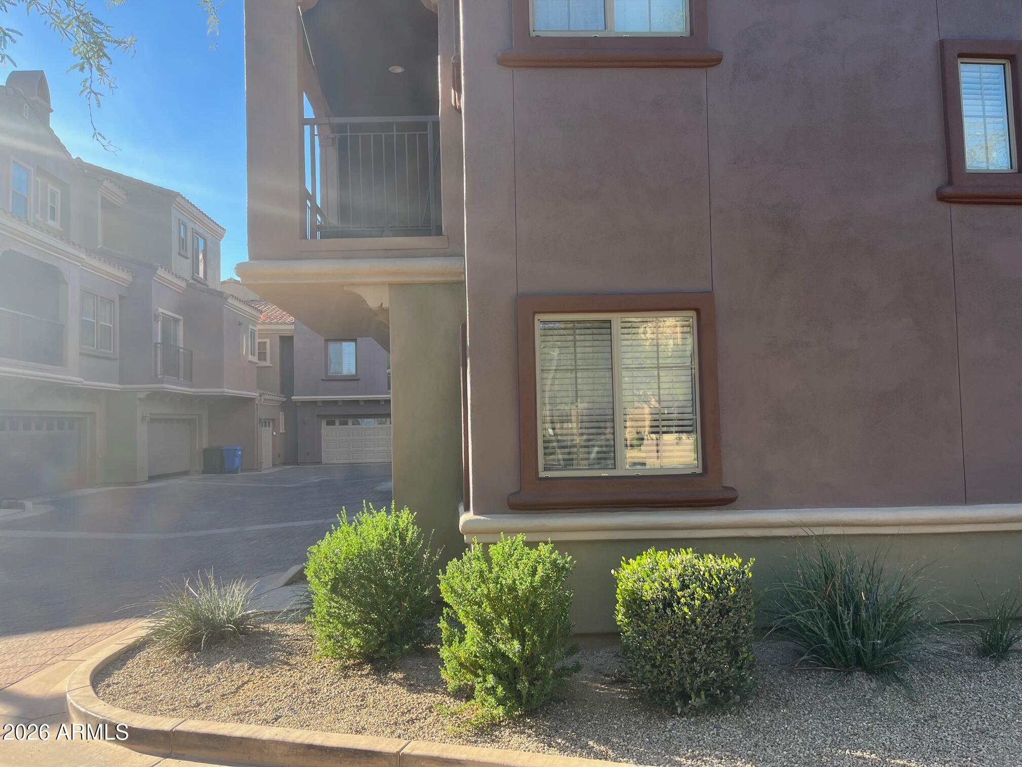 3935 East Rough Rider Road, Unit 1057 Phoenix, AZ 85050 - Photo 2 of 21 a house with a sink