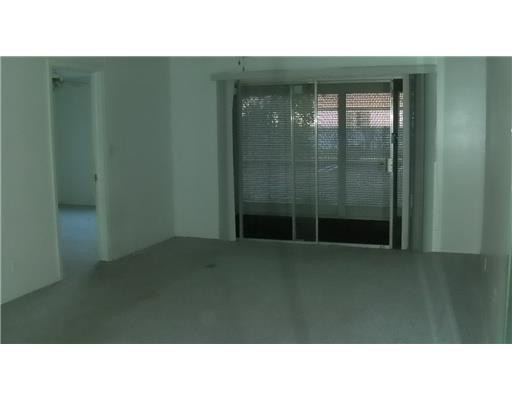 8605 West Sample Road, Unit 111 Coral Springs, FL 33065 - Photo 11 of 13 Living Room