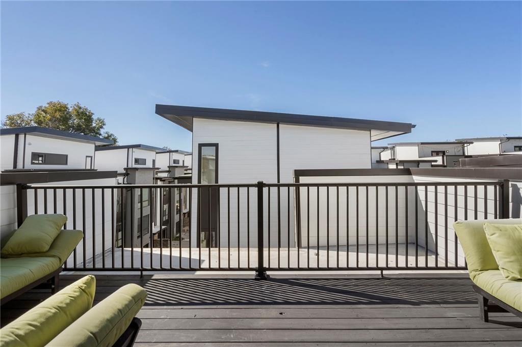 61 Moda Lane Atlanta, GA 30307 - Photo 22 of 34 a balcony view with a chair