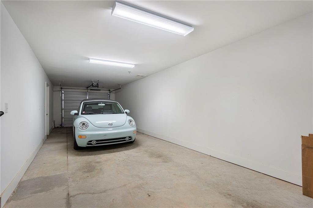 61 Moda Lane Atlanta, GA 30307 - Photo 33 of 34 a car parked in a parking