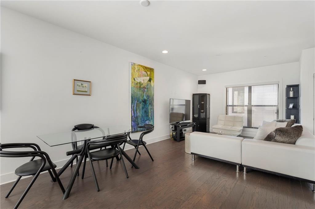 61 Moda Lane Atlanta, GA 30307 - Photo 9 of 34 a living room with furniture and a large window