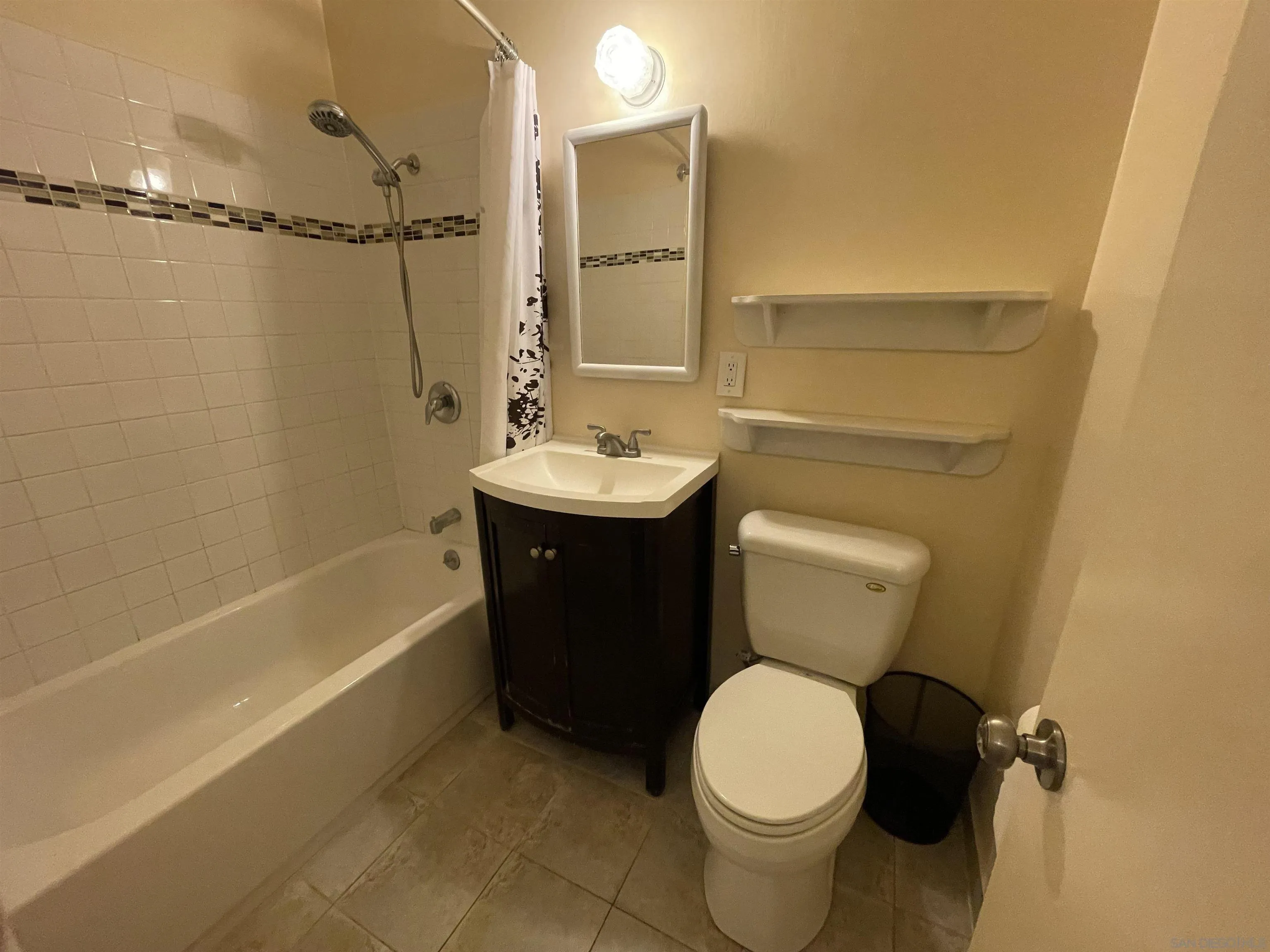 9225 Penmar Road Santee, CA 92071 - Photo 8 of 17 a bathroom with a sink toilet and shower