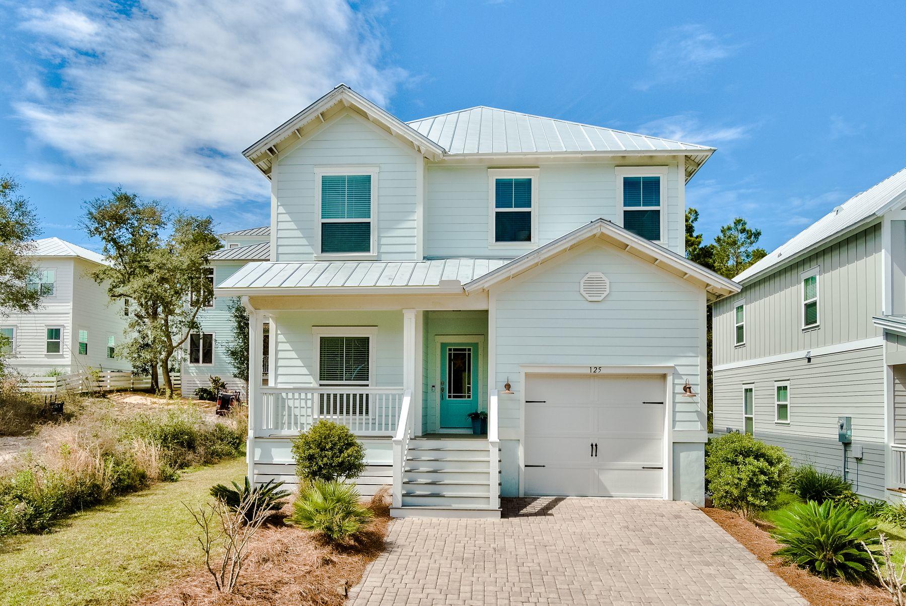 125 Grande Pointe Circle Inlet Beach, FL 32461 - Photo 1 of 30 a front view of a house with a yard