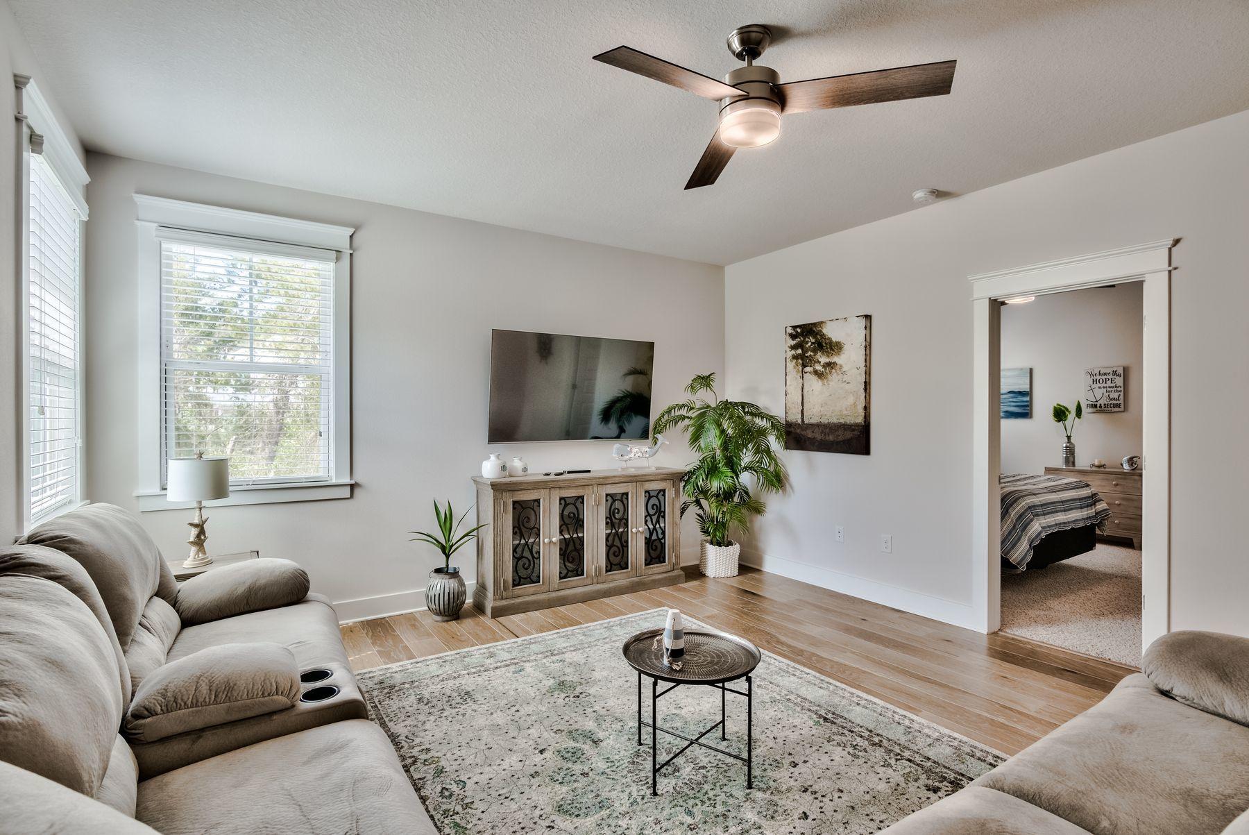 125 Grande Pointe Circle Inlet Beach, FL 32461 - Photo 20 of 30 a living room with furniture and a flat screen tv