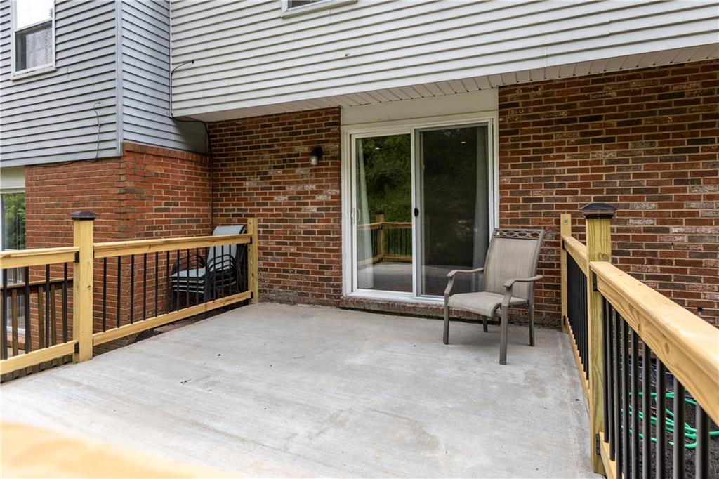 706 Countryside Drive McKees Rocks, PA 15136 - Photo 20 of 23 a view of a patio with chairs and a barbeque