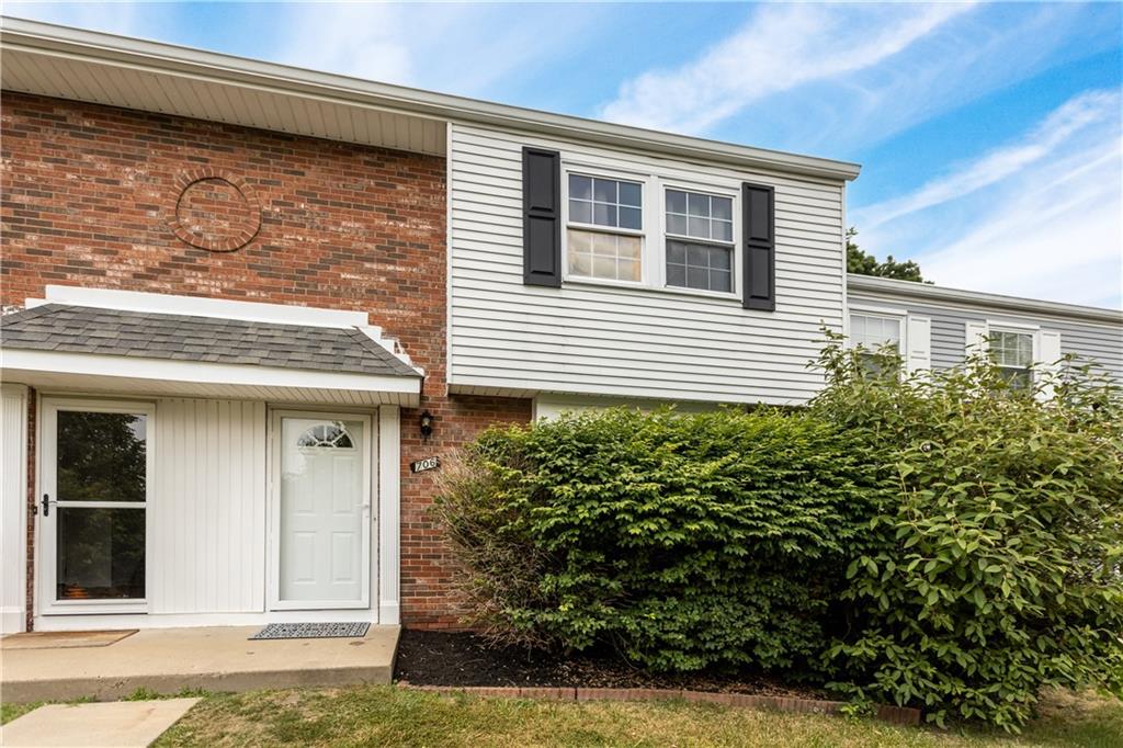 706 Countryside Drive McKees Rocks, PA 15136 - Photo 2 of 23 a front view of a house with garden