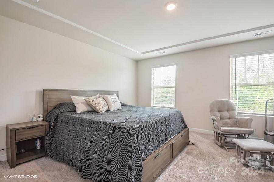 11955 Old Statesville Road Huntersville, NC 28078 - Photo 18 of 39 a bedroom with a bed and wooden floor