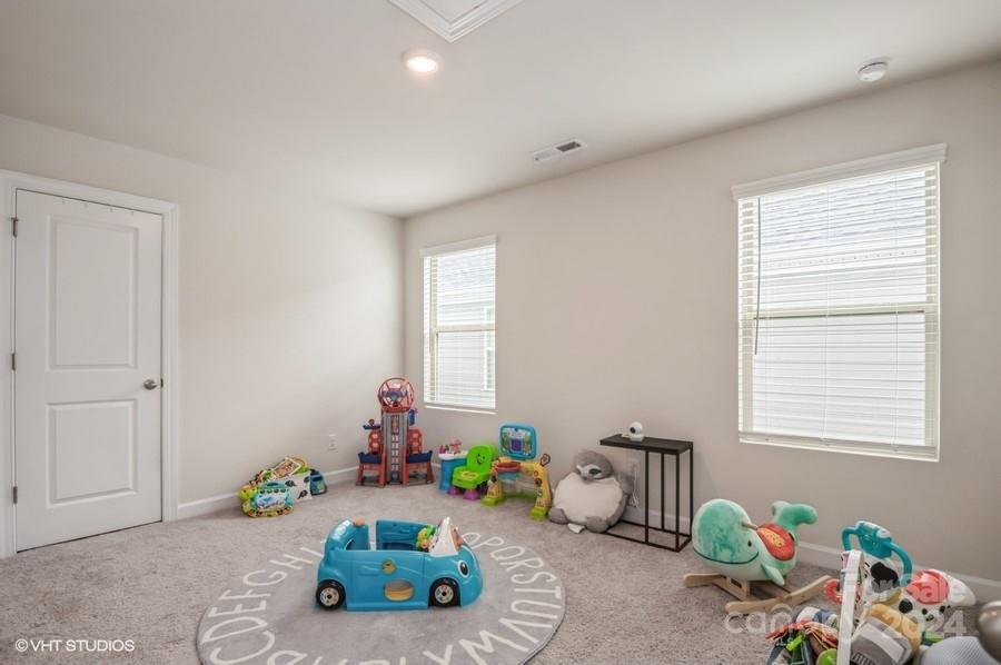 11955 Old Statesville Road Huntersville, NC 28078 - Photo 25 of 39 a room with toys and a window