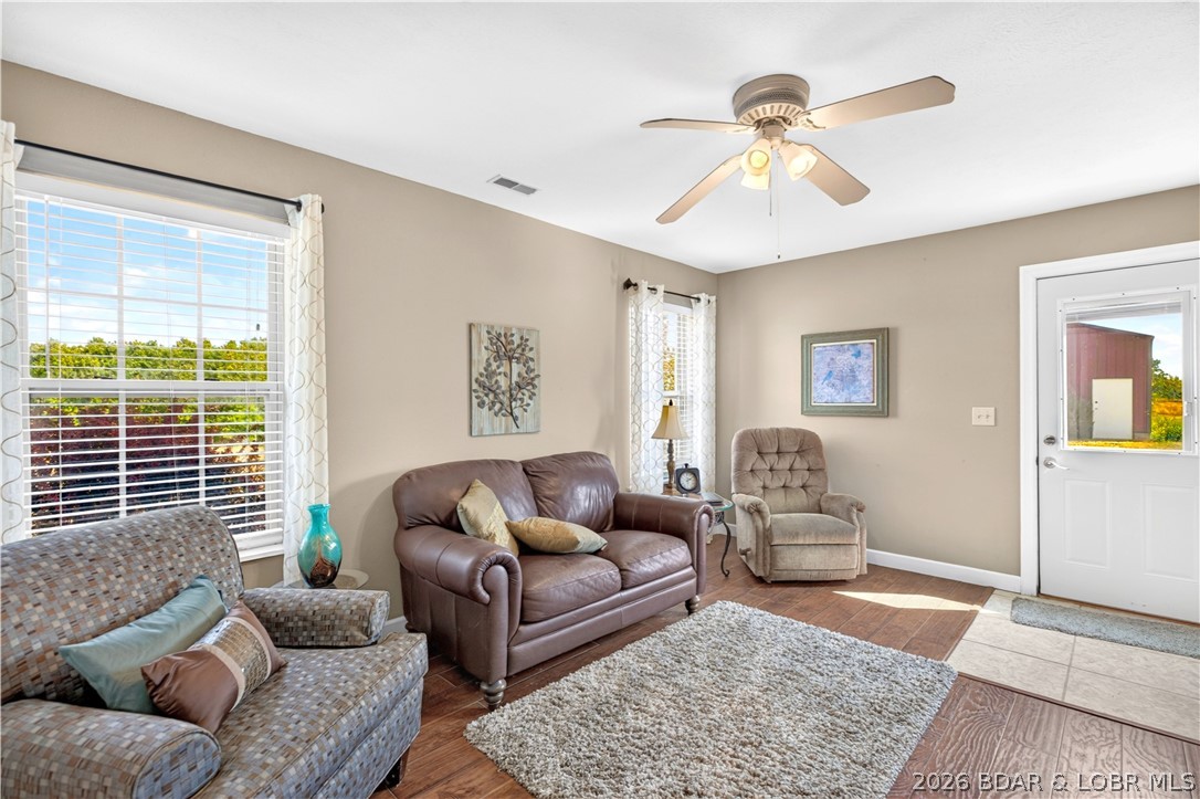 105 Dallas Road Macks Creek, MO 65786 - Photo 12 of 49 Main Level Living Room with Exterior Entry Door