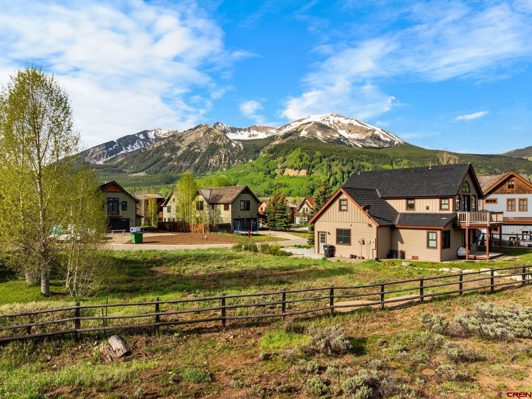 140 Alpine Court Crested Butte, CO 81224 - Photo 13 of 19 a view of house with a big yard