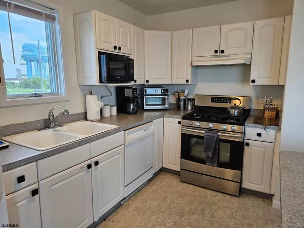 a view of a terrace with sitting area