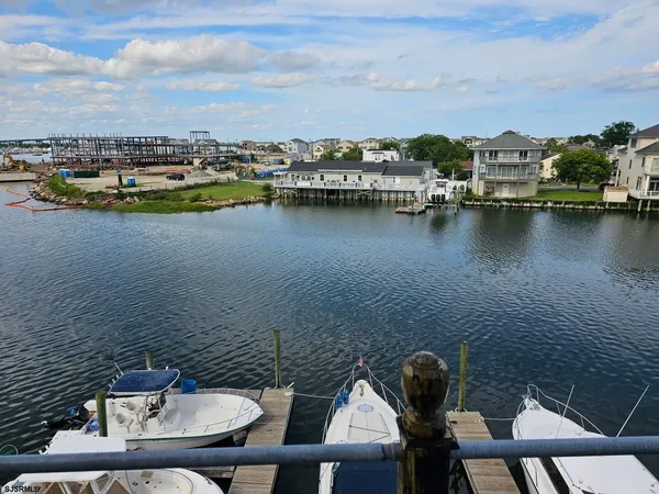 a bedroom with a bed and a mirror