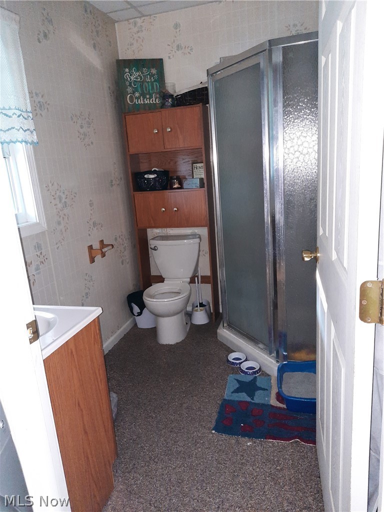 1906 Creston Road Cambridge, OH 43725 - Photo 19 of 29 First floor bathroom and Laundry