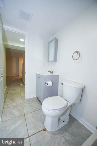 a view of cabinets with wooden floor