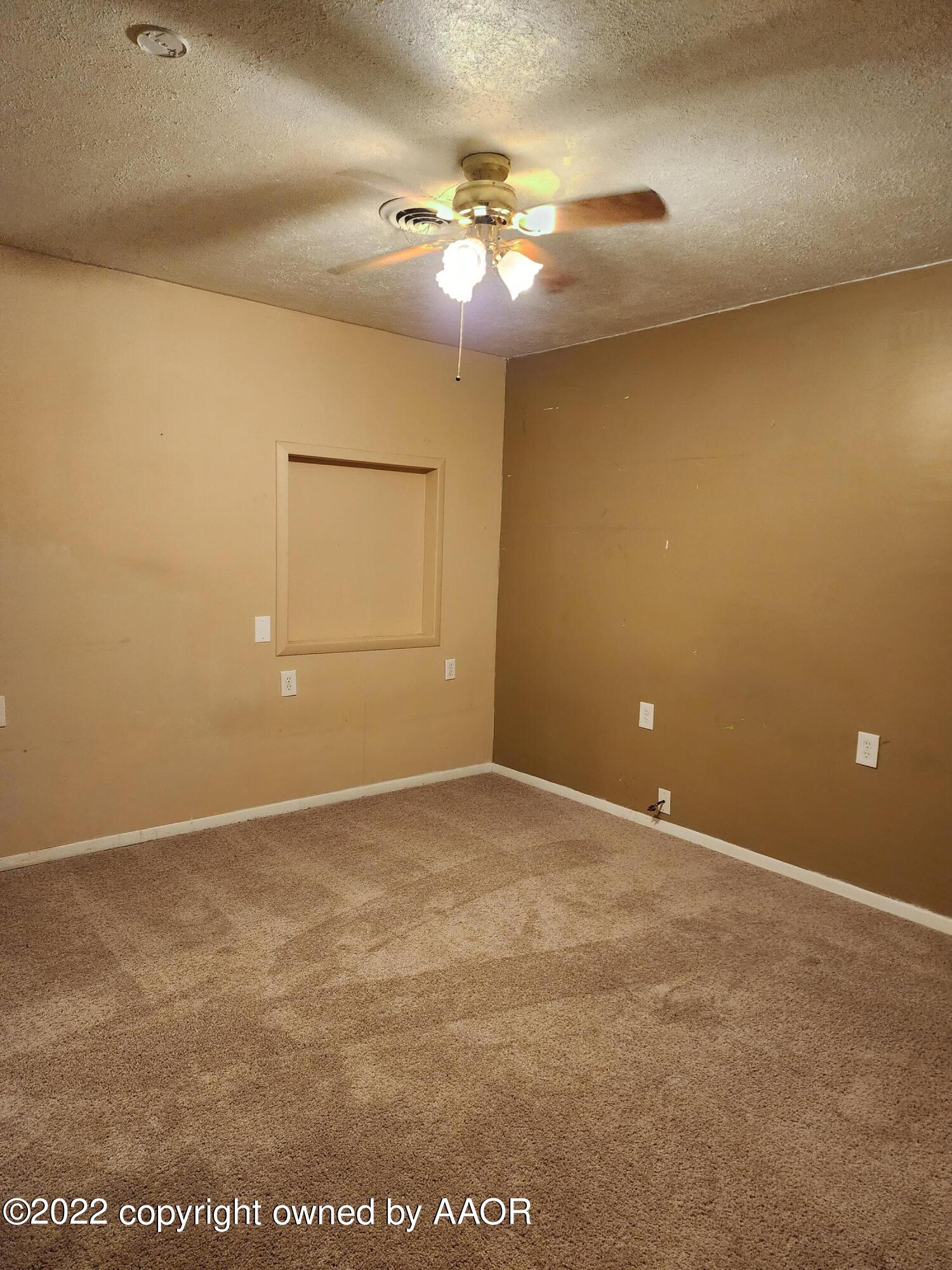 120 Pinon Street Borger, TX 79007 - Photo 8 of 19 a view of an empty room