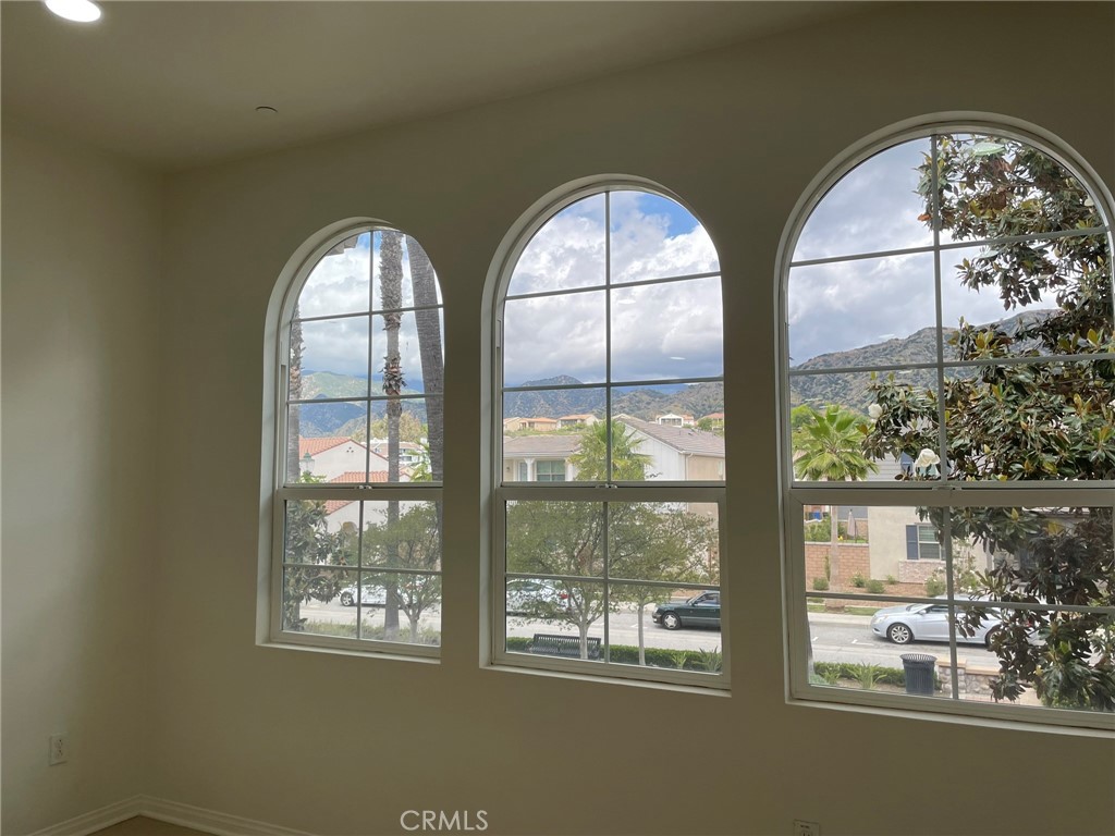 810 The Promenade, Unit C Azusa, CA 91702 - Photo 12 of 38 a view of wooden floor and a window