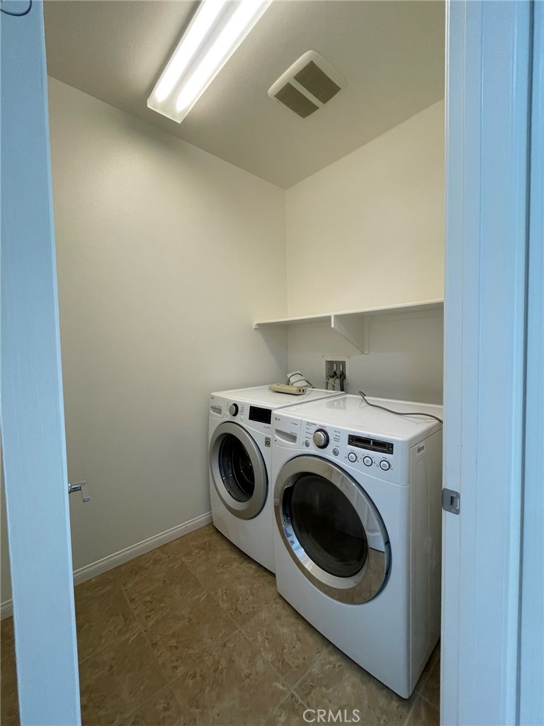 810 The Promenade, Unit C Azusa, CA 91702 - Photo 26 of 38 a utility room with dryer and washer